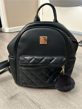 Black Quilted Mini Backpack Purse with Faux Fur Pom Pom